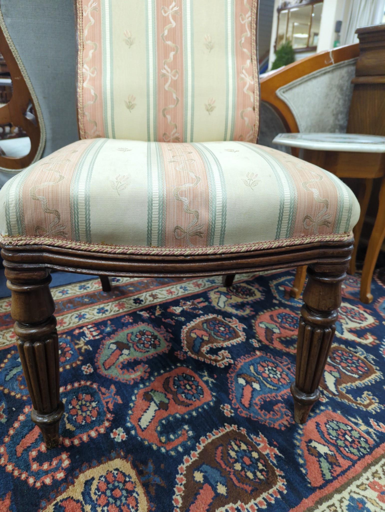 A single Regency mahogany upholstered side chair